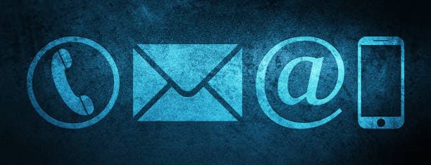 Warmly lit hostel building at dusk